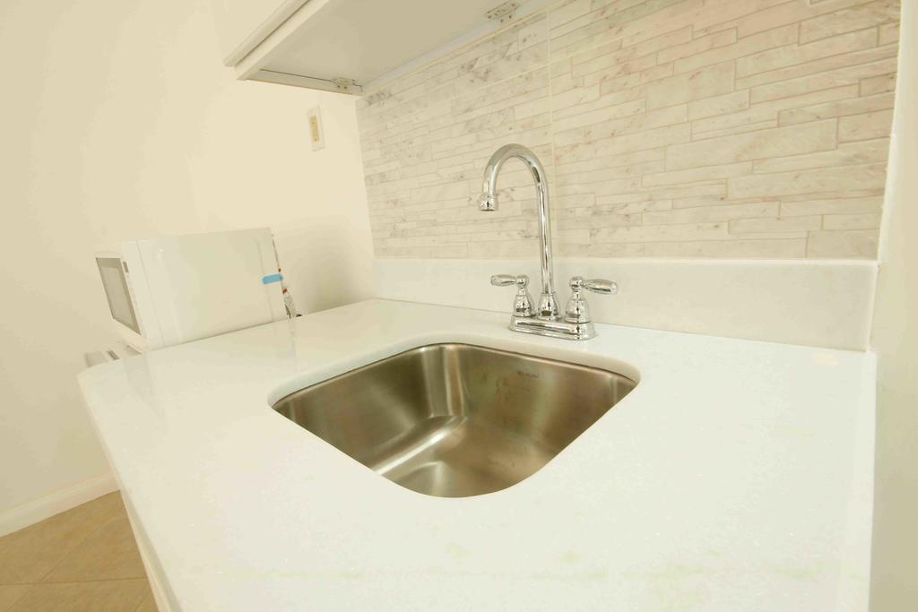 Cattleya Luxury Suites Kingston Quarto foto